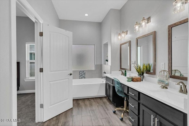 14521 Petralia Ave, El Paso, TX 79938 - bathroom with double vanity and a garden tub
