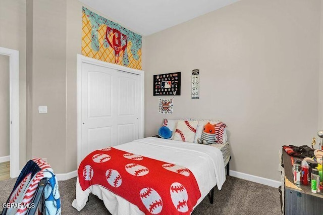 14521 Petralia Ave, El Paso, TX 79938 - carpeted bedroom with baseboards and a closet