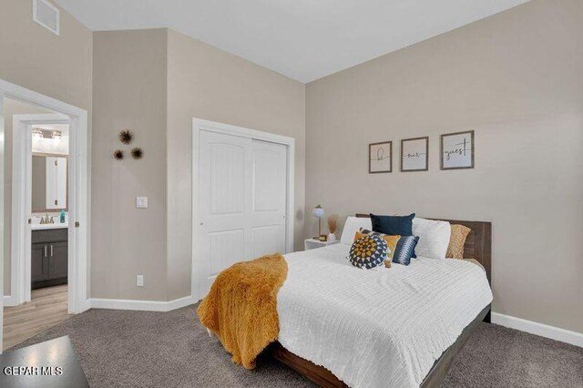 14521 Petralia Ave, El Paso, TX 79938 - bedroom featuring baseboards, carpet flooring, a closet, and a sink
