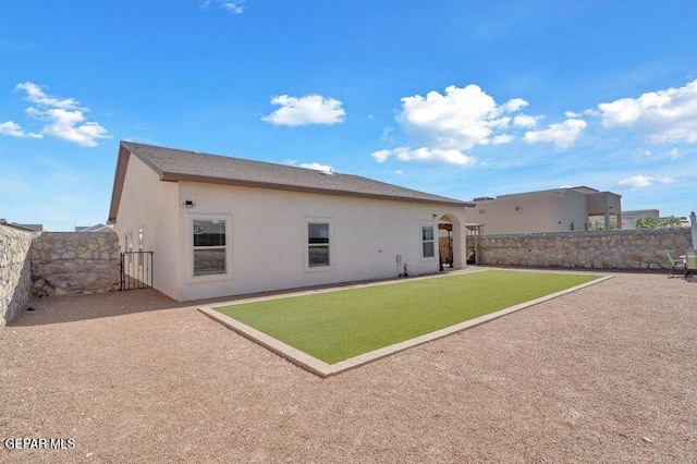 14521 Petralia Ave, El Paso, TX 79938 - back of property featuring stucco siding, a patio, and a gate