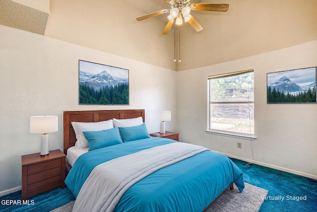 12044 Banner Crest Dr, El Paso, TX 79936 - bedroom with carpet flooring, baseboards, ceiling fan, and high vaulted ceiling