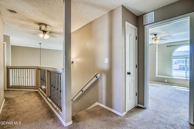 11352 Bullseye St, El Paso, TX 79934 - stairs with ceiling fan, carpet floors, a textured ceiling, and baseboards