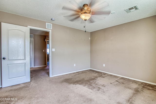 11352 Bullseye St, El Paso, TX 79934 - spare room featuring carpet, ceiling fan, a textured ceiling, and baseboards