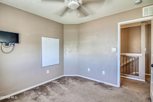 11352 Bullseye St, El Paso, TX 79934 - unfurnished room featuring a ceiling fan, carpet flooring, baseboards, a textured ceiling, and a smoke detector
