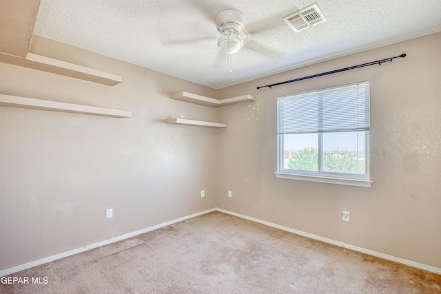 11352 Bullseye St, El Paso, TX 79934 - carpeted empty room with ceiling fan, baseboards, and a textured ceiling