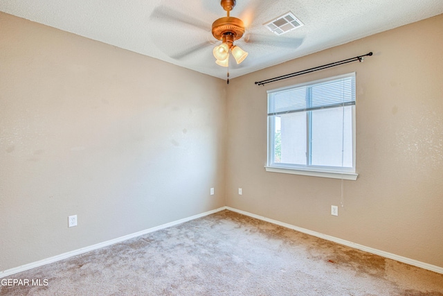 11352 Bullseye St, El Paso, TX 79934 - spare room featuring carpet flooring, a ceiling fan, and baseboards