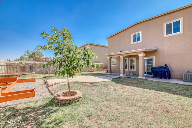11352 Bullseye St, El Paso, TX 79934 - view of yard with a patio, central AC, and a vegetable garden