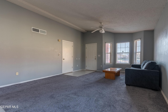 6224 Rhine Bridge Dr, El Paso, TX 79934 - carpeted living room featuring a ceiling fan and a textured ceiling