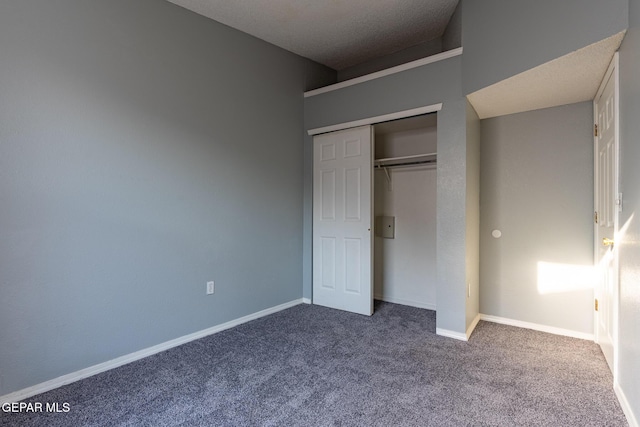 6224 Rhine Bridge Dr, El Paso, TX 79934 - unfurnished bedroom with dark carpet and a closet