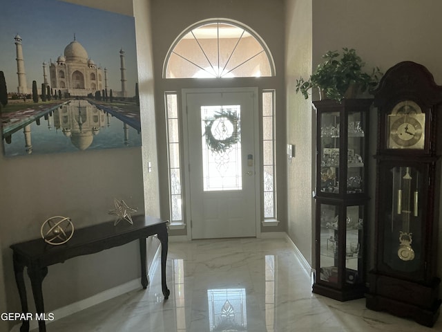 729 Cinnamon Teal Cir, El Paso, TX 79932 - foyer entrance featuring marble tiled floors and baseboards