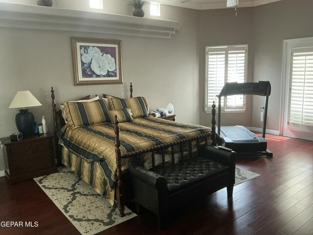 729 Cinnamon Teal Cir, El Paso, TX 79932 - bedroom with dark wood finished floors and ornamental molding