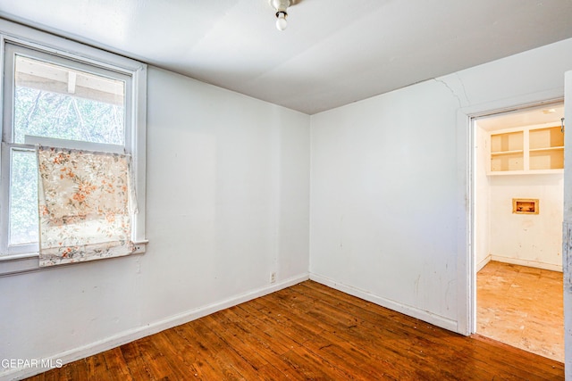 124 N Toledo Pl, El Paso, TX 79905 - empty room featuring hardwood / wood-style flooring and baseboards