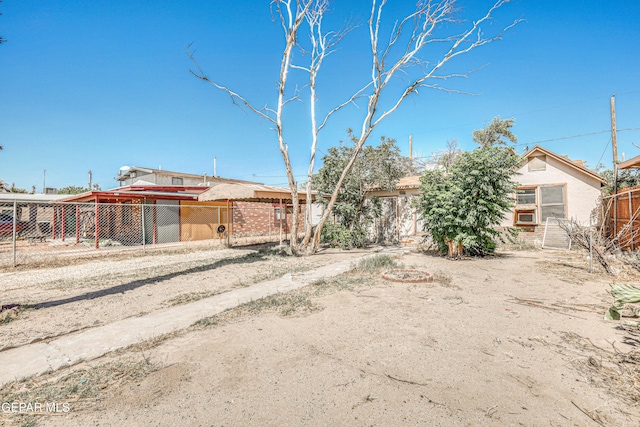 124 N Toledo Pl, El Paso, TX 79905 - view of front facade with a fenced backyard