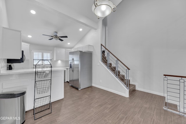 12055 Van Gogh Dr, El Paso, TX 79936 - unfurnished living room with ceiling fan, beamed ceiling, stairs, recessed lighting, and light wood-type flooring