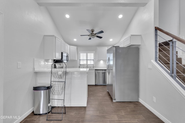 12055 Van Gogh Dr, El Paso, TX 79936 - kitchen featuring appliances with stainless steel finishes, ceiling fan, white cabinets, light countertops, and dark wood-style floors