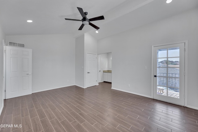 12055 Van Gogh Dr, El Paso, TX 79936 - unfurnished living room with a ceiling fan, baseboards, dark wood-style floors, recessed lighting, and high vaulted ceiling