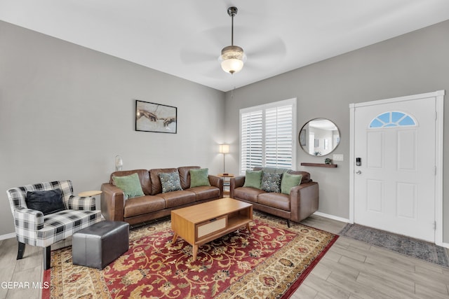 13936 Garforth Ave, El Paso, TX 79928 - living room with a ceiling fan, light wood-style flooring, and baseboards