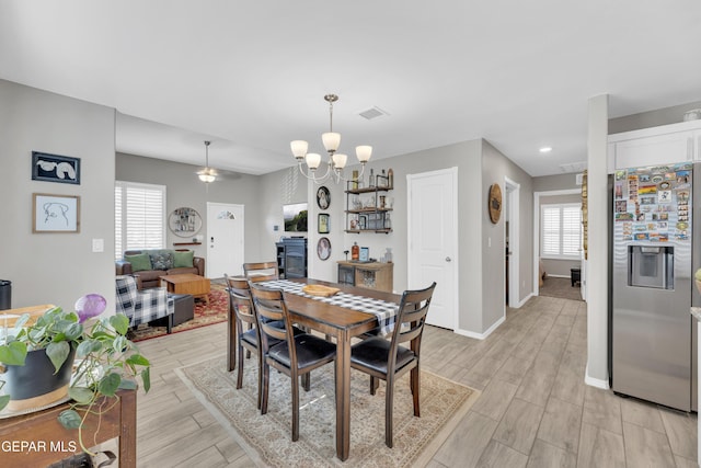 13936 Garforth Ave, El Paso, TX 79928 - dining area featuring healthy amount of natural light, wood tiled floors, baseboards, a chandelier, and recessed lighting