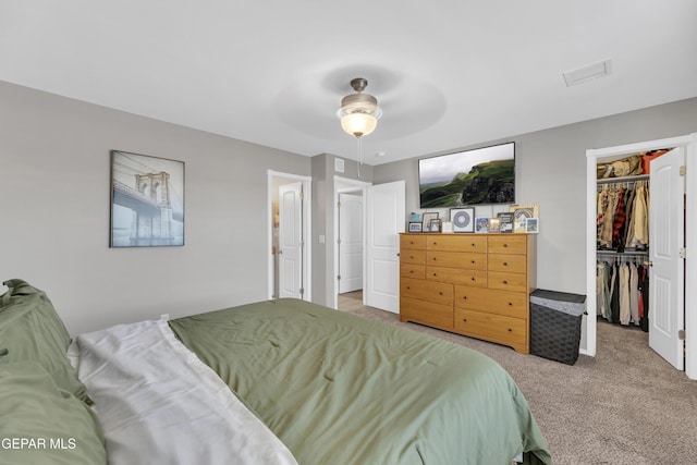 13936 Garforth Ave, El Paso, TX 79928 - carpeted bedroom with a spacious closet, ceiling fan, and a closet