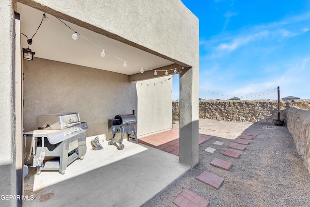 13936 Garforth Ave, El Paso, TX 79928 - fenced backyard with a patio area and grilling area