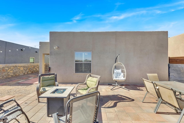 13936 Garforth Ave, El Paso, TX 79928 - view of patio featuring an outdoor fire pit