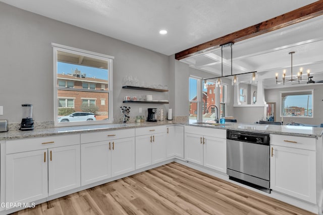 2729 Pershing Dr, El Paso, TX 79903 - kitchen featuring dishwasher, a sink, light wood-type flooring, beamed ceiling, and a peninsula