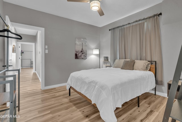 2729 Pershing Dr, El Paso, TX 79903 - bedroom featuring light wood-style flooring, baseboards, and ceiling fan