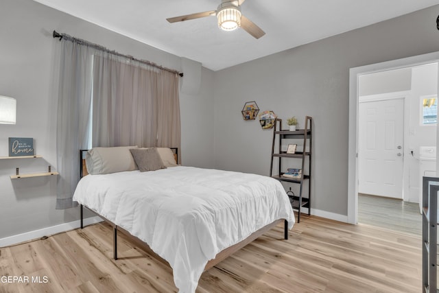 2729 Pershing Dr, El Paso, TX 79903 - bedroom featuring baseboards, light wood-style flooring, and ceiling fan