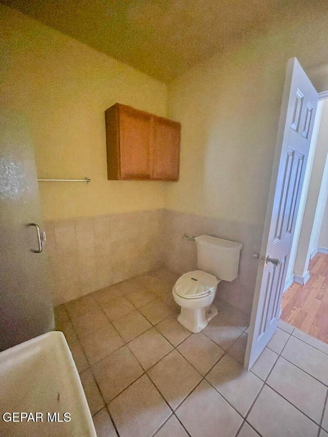 2526 Yandell Dr, El Paso, TX 79903 - bathroom featuring tile patterned flooring and toilet