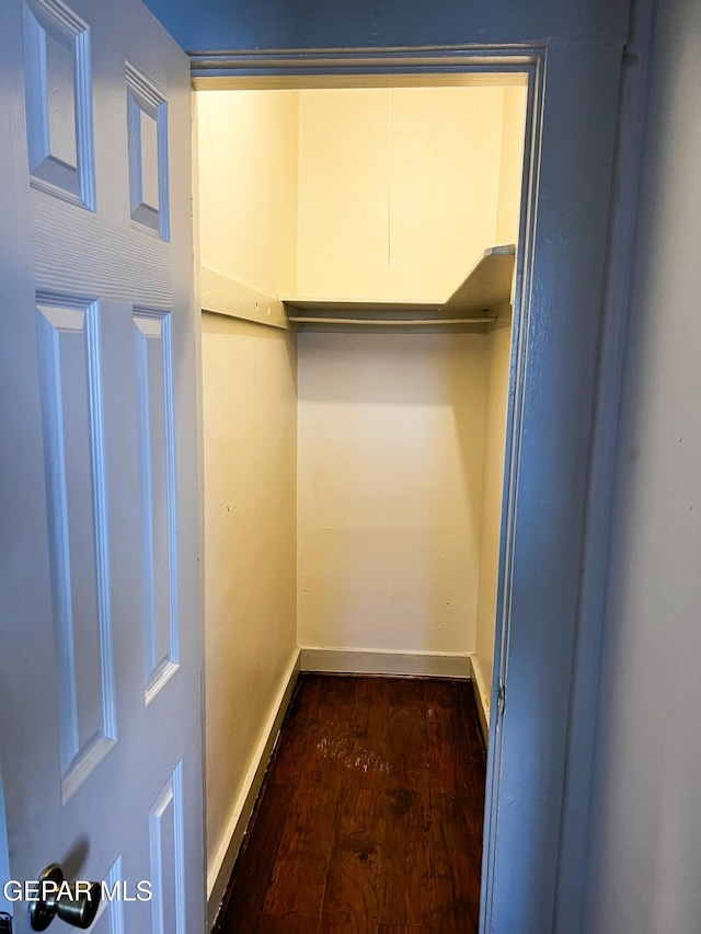 2526 Yandell Dr, El Paso, TX 79903 - walk in closet with dark wood finished floors