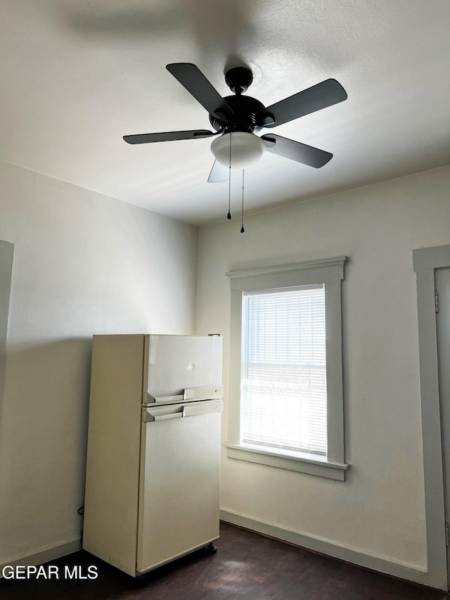 2526 Yandell Dr, El Paso, TX 79903 - kitchen featuring freestanding refrigerator, ceiling fan, dark wood-style flooring, and baseboards