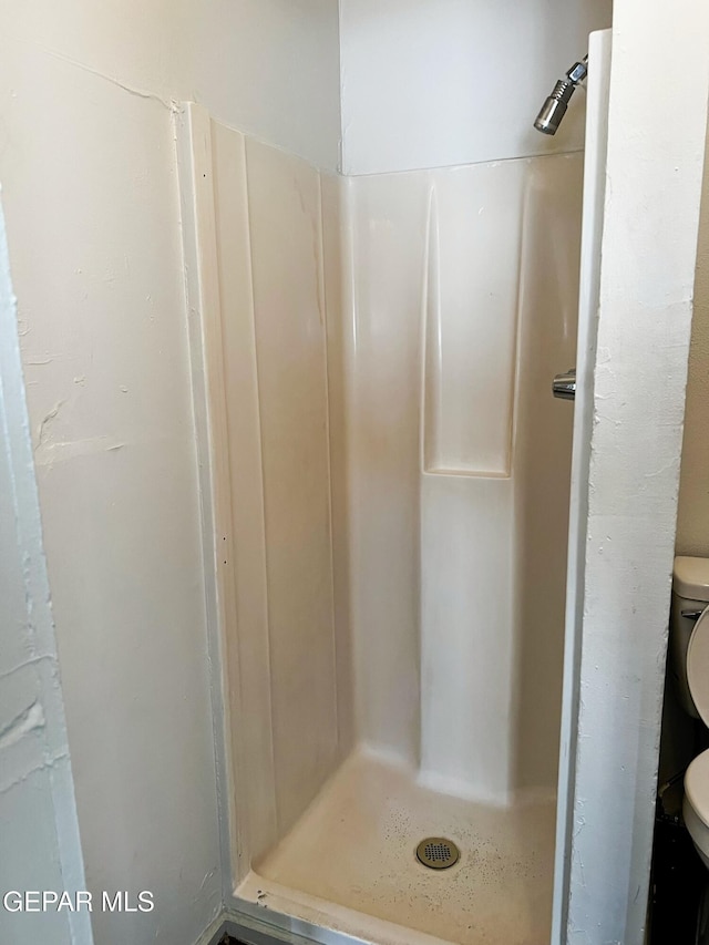 2526 Yandell Dr, El Paso, TX 79903 - full bath with toilet and a stall shower