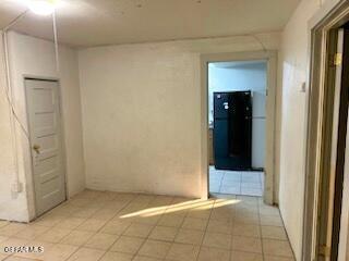 2526 Yandell Dr, El Paso, TX 79903 - hall featuring light tile patterned floors