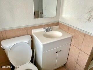 2526 Yandell Dr, El Paso, TX 79903 - half bathroom featuring toilet and vanity