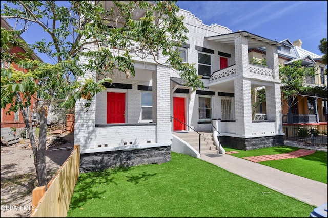 615 Arizona Ave, El Paso, TX 79902 - view of front of property with brick siding and a balcony