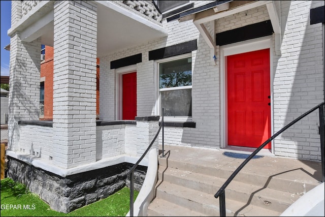 615 Arizona Ave, El Paso, TX 79902 - doorway to property with brick siding