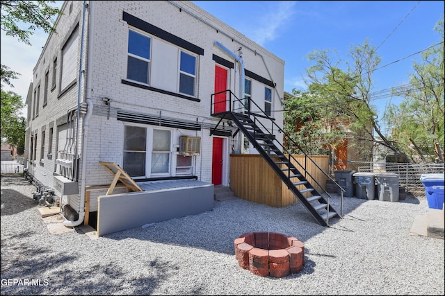 615 Arizona Ave, El Paso, TX 79902 - view of front of property with brick siding, an outdoor fire pit, and stairway