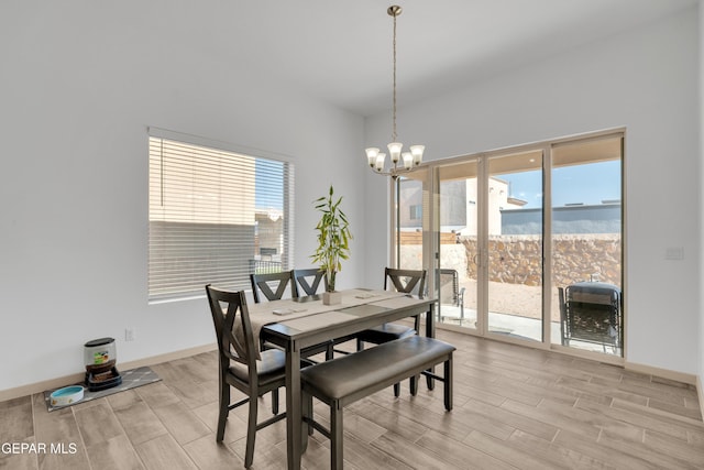 12614 Amesbury, El Paso, TX 79928 - dining room with wood finish floors, a chandelier, and baseboards