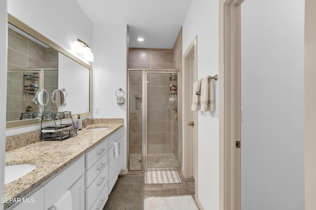 12614 Amesbury, El Paso, TX 79928 - full bath with double vanity and a stall shower
