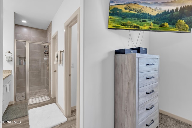 12614 Amesbury, El Paso, TX 79928 - bathroom with a stall shower, vanity, baseboards, and recessed lighting