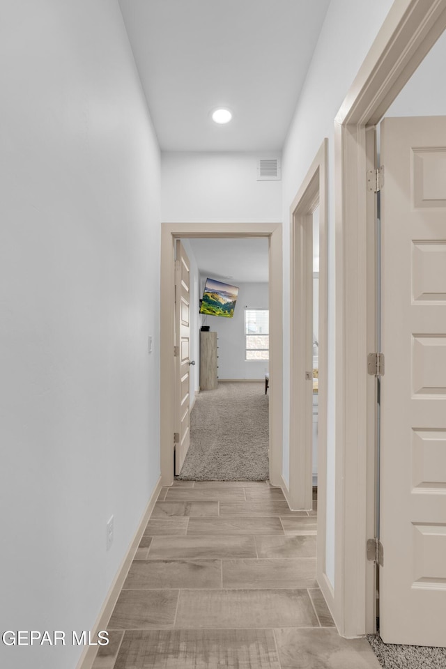 12614 Amesbury, El Paso, TX 79928 - corridor with recessed lighting, baseboards, and light wood-style floors