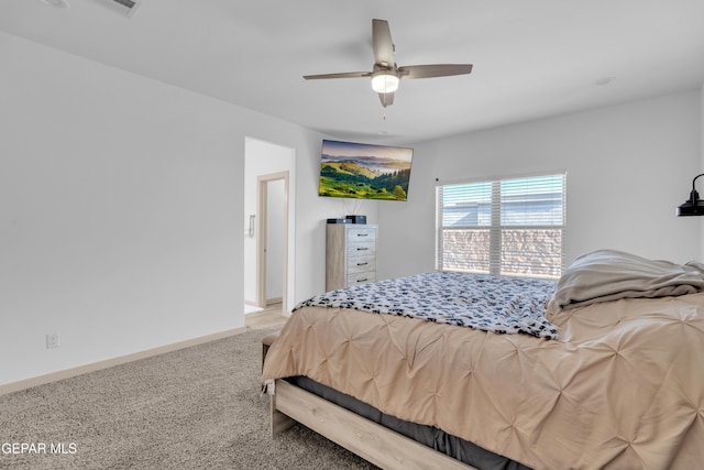 12614 Amesbury, El Paso, TX 79928 - bedroom featuring light carpet, a ceiling fan, and baseboards