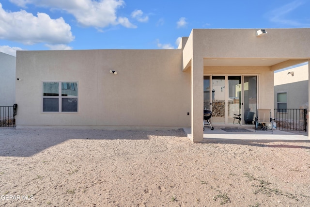 12614 Amesbury, El Paso, TX 79928 - back of house with a patio and stucco siding