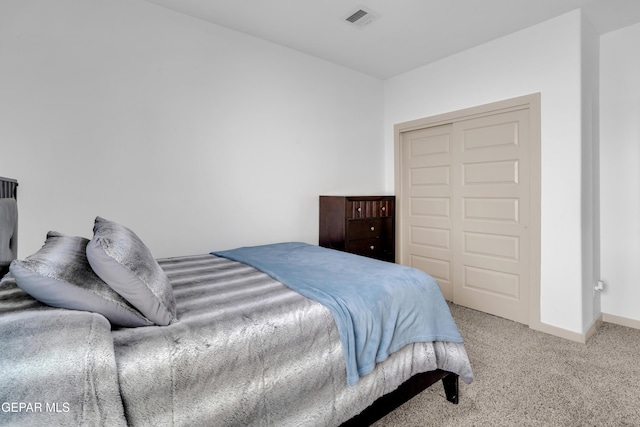 12614 Amesbury, El Paso, TX 79928 - carpeted bedroom featuring a closet and baseboards