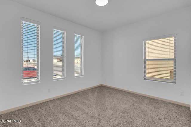 12614 Amesbury, El Paso, TX 79928 - carpeted spare room with healthy amount of natural light and baseboards