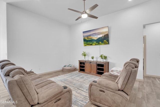 12614 Amesbury, El Paso, TX 79928 - living room featuring ceiling fan, wood finished floors, and baseboards