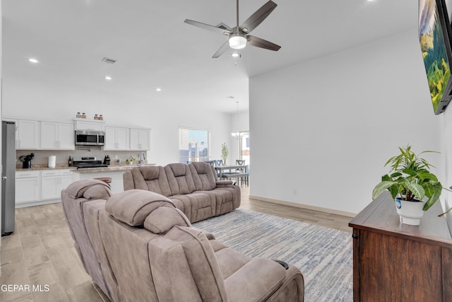 12614 Amesbury, El Paso, TX 79928 - living room with recessed lighting, a ceiling fan, light wood-style floors, and baseboards