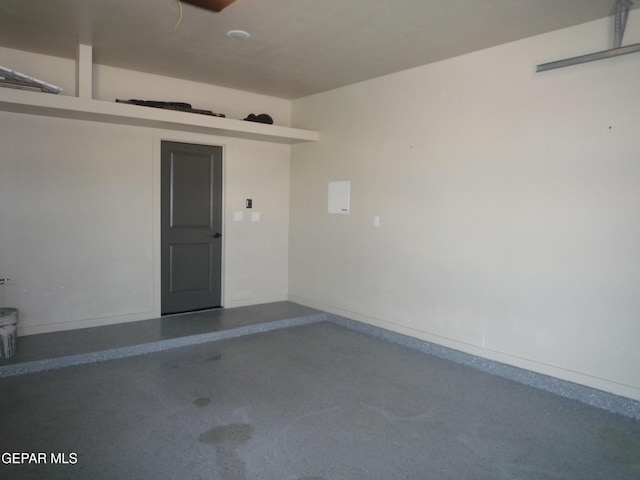 5868 Valley Palm Dr, El Paso, TX 79932 - garage with baseboards