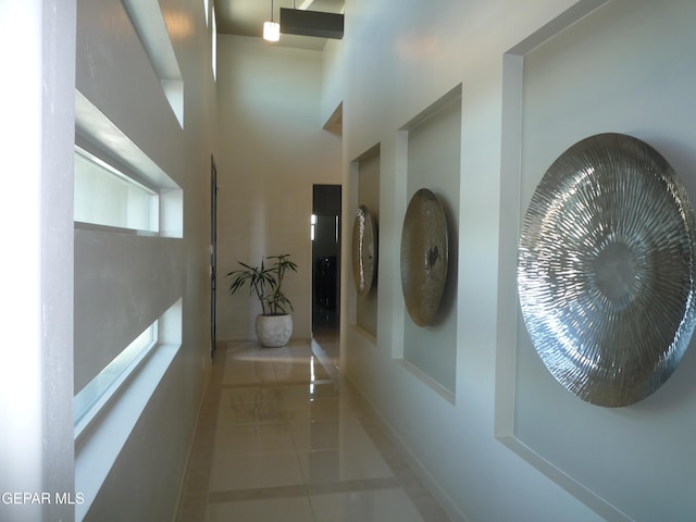 5868 Valley Palm Dr, El Paso, TX 79932 - corridor with tile patterned floors and a high ceiling