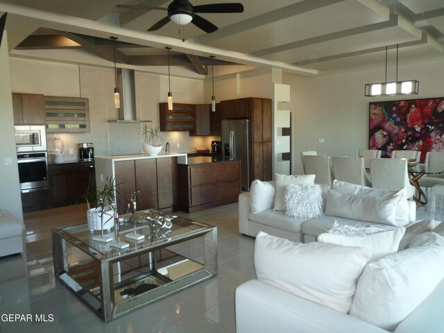 5868 Valley Palm Dr, El Paso, TX 79932 - tiled living area featuring ceiling fan, beam ceiling, and a sink